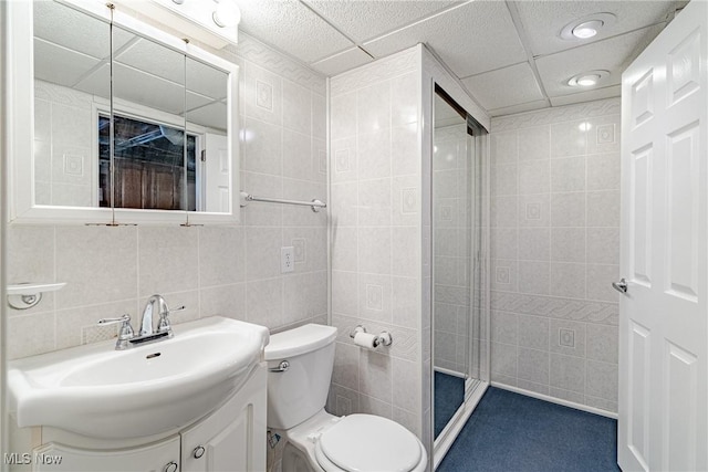 29511 Grand Blvd, Wickliffe, OH 44092 - bathroom with tile walls, vanity, a shower stall, and recessed lighting