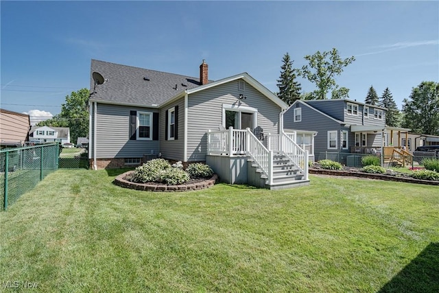 29511 Grand Blvd, Wickliffe, OH 44092 - rear view of property featuring a chimney, a fenced backyard, a shingled roof, stairs, and a deck