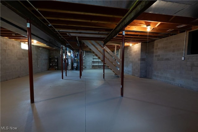 9812 Creekside Way, Streetsboro, OH 44241 - unfinished basement featuring stairway and gas water heater
