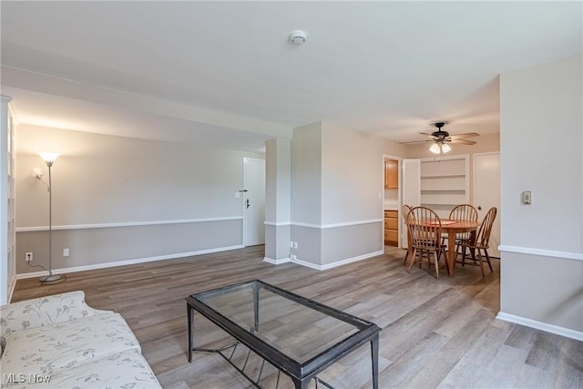 19201 Van Aken Blvd Unit 211, Shaker Heights, OH 44122 - living room with wood finished floors and ceiling fan