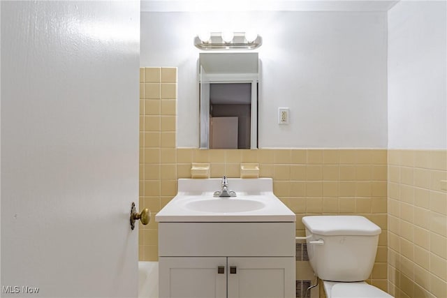 19201 Van Aken Blvd Unit 211, Shaker Heights, OH 44122 - bathroom with vanity, tile walls, and a bath