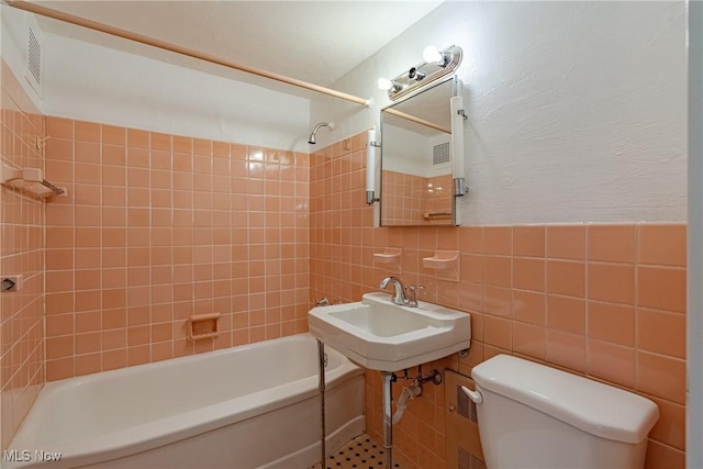 19201 Van Aken Blvd Unit 211, Shaker Heights, OH 44122 - full bathroom featuring shower / bath combination, tile walls, and tasteful backsplash