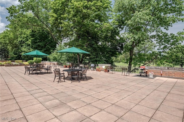19201 Van Aken Blvd Unit 211, Shaker Heights, OH 44122 - view of patio with view of wooded area