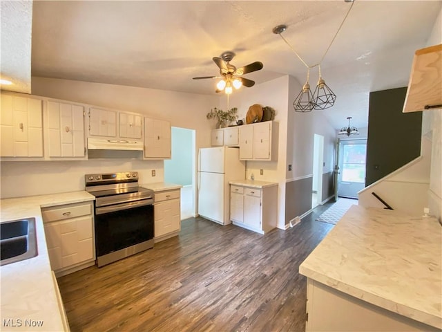 123 Prentiss St, Munroe Falls, OH 44262 - kitchen with electric range, freestanding refrigerator, a ceiling fan, light countertops, and dark wood-style floors