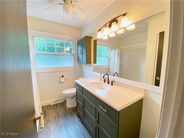 123 Prentiss St, Munroe Falls, OH 44262 - full bathroom with vanity, wood finished floors, ceiling fan, and curtained shower