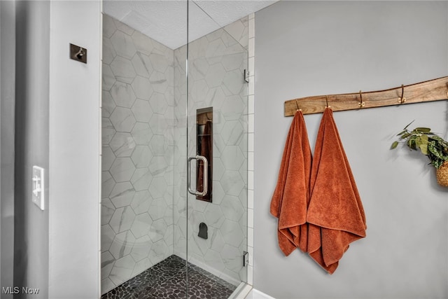 567 Westminster Cir, Akron, OH 44319 - bathroom with a stall shower and a textured ceiling