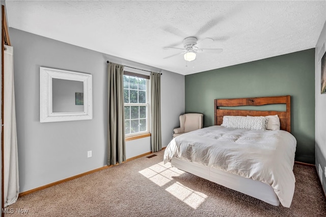 567 Westminster Cir, Akron, OH 44319 - bedroom with carpet flooring, a textured ceiling, and a ceiling fan