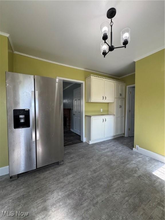 358 N 8th St, Coshocton, OH 43812 - kitchen featuring stainless steel fridge with ice dispenser, crown molding, wood finished floors, a chandelier, and white cabinets