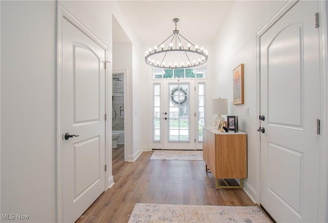 993 Pin Oaks Dr, Broadview Heights, OH 44147 - foyer entrance featuring light wood-style flooring and a chandelier