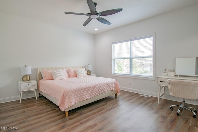993 Pin Oaks Dr, Broadview Heights, OH 44147 - bedroom featuring wood finished floors, recessed lighting, and ceiling fan