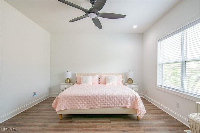 993 Pin Oaks Dr, Broadview Heights, OH 44147 - bedroom featuring multiple windows, wood finished floors, recessed lighting, and a ceiling fan