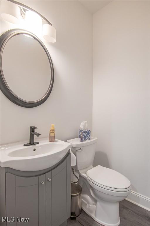 993 Pin Oaks Dr, Broadview Heights, OH 44147 - bathroom featuring vanity and wood finished floors