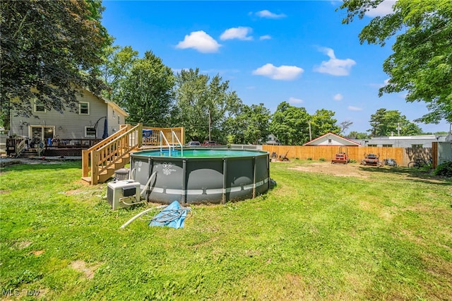 6086 N Wright St, Kingsville, OH 44048 - fenced backyard featuring a wooden deck