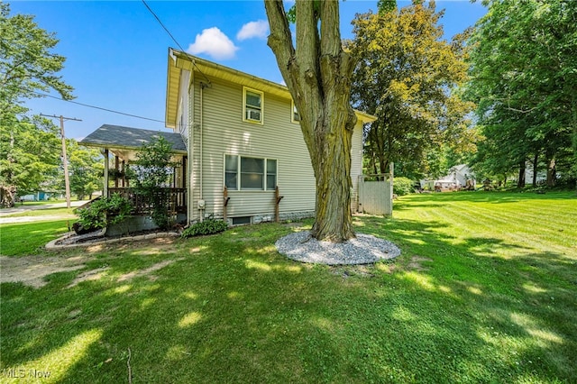 6086 N Wright St, Kingsville, OH 44048 - view of home's exterior featuring a lawn