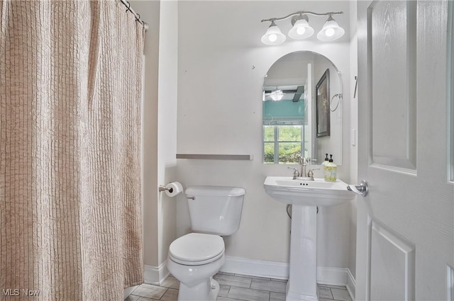 7305 Alexander Rd, Concord, OH 44077 - full bathroom with a ceiling fan and curtained shower