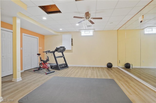 7305 Alexander Rd, Concord, OH 44077 - exercise room with wood finished floors, ceiling fan, and a paneled ceiling