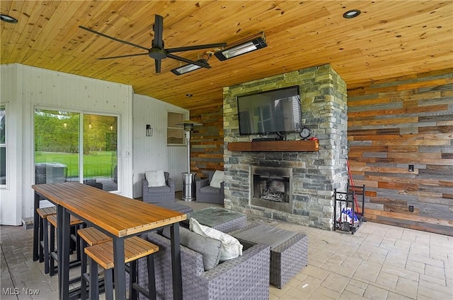 7305 Alexander Rd, Concord, OH 44077 - view of patio / terrace with an outdoor stone fireplace and ceiling fan