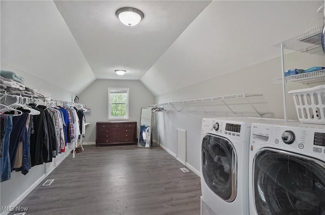 7305 Alexander Rd, Concord, OH 44077 - washroom featuring washing machine and dryer and dark wood-style floors