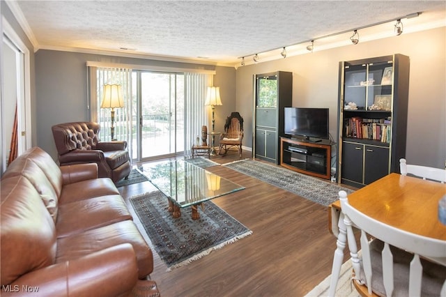 2021 King James Pkwy Unit 214, Westlake, OH 44145 - living area featuring ornamental molding, wood finished floors, track lighting, and a textured ceiling