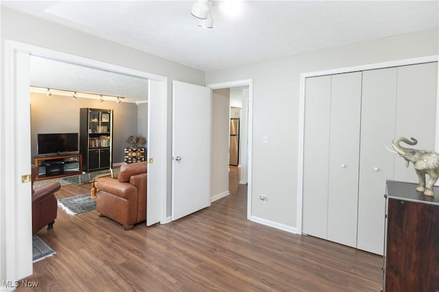 2021 King James Pkwy Unit 214, Westlake, OH 44145 - living room with track lighting and wood finished floors