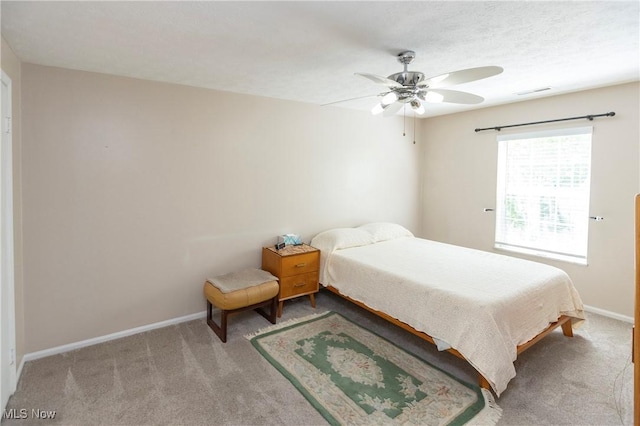 2021 King James Pkwy Unit 214, Westlake, OH 44145 - carpeted bedroom with baseboards and a ceiling fan