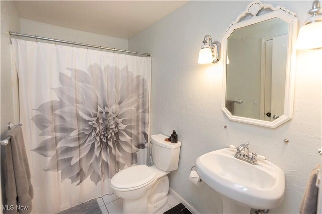 2021 King James Pkwy Unit 214, Westlake, OH 44145 - full bathroom featuring tile patterned floors and a shower with shower curtain