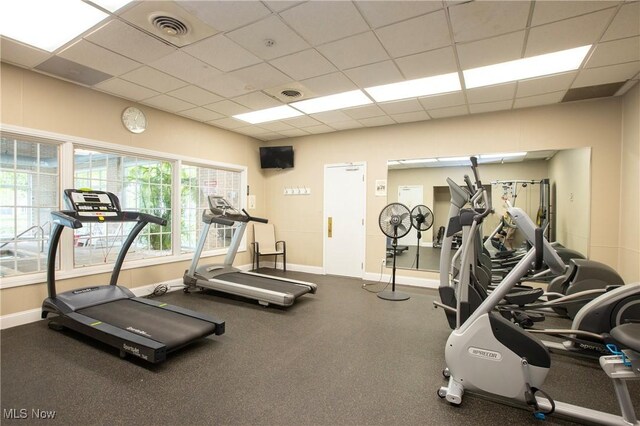 2021 King James Pkwy Unit 214, Westlake, OH 44145 - workout area with baseboards and a drop ceiling