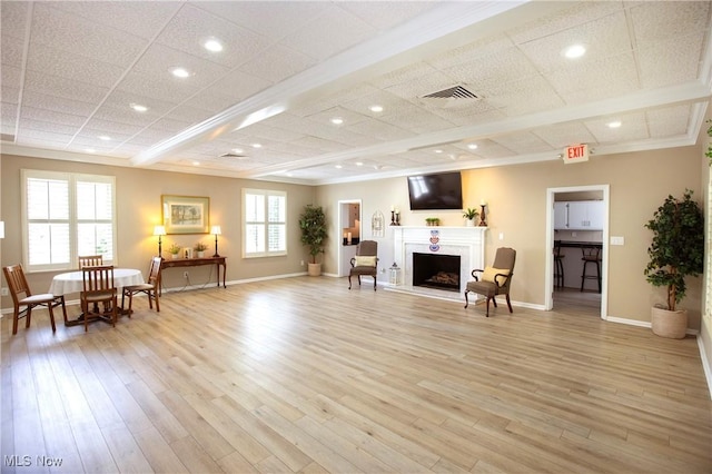 2021 King James Pkwy Unit 214, Westlake, OH 44145 - living room with crown molding, a fireplace, light wood-style flooring, and recessed lighting