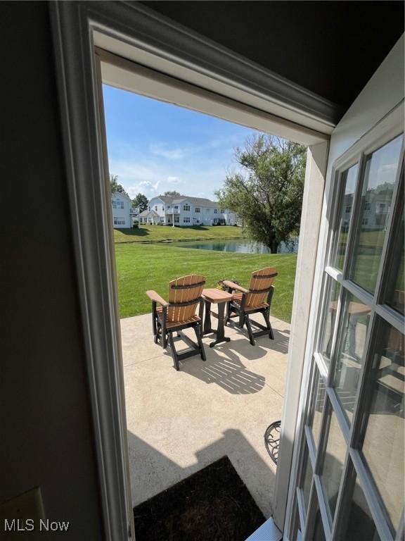 1315 Cascade Cir E, Canton, OH 44708 - view of patio with a water view
