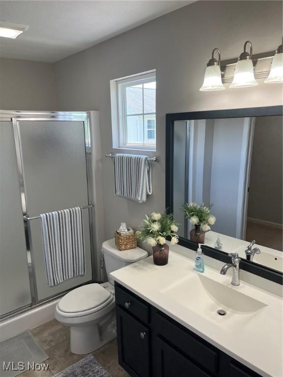 1315 Cascade Cir E, Canton, OH 44708 - full bathroom with vanity and a shower stall