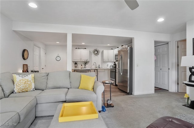 47688 Tomahawk Dr, Negley, OH 44441 - living area featuring recessed lighting, light colored carpet, and a ceiling fan