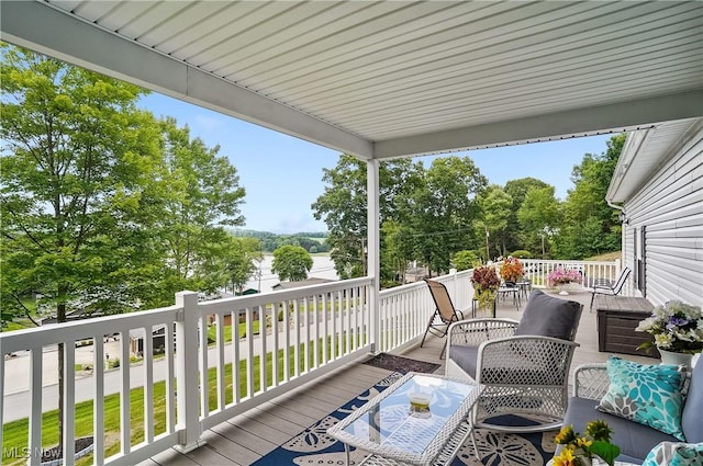 47688 Tomahawk Dr, Negley, OH 44441 - deck with outdoor dining area and view of scattered trees