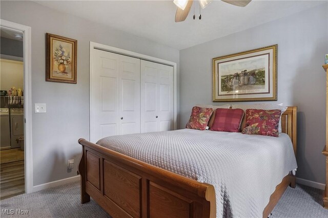 47688 Tomahawk Dr, Negley, OH 44441 - carpeted bedroom featuring independent washer and dryer, a closet, and a ceiling fan