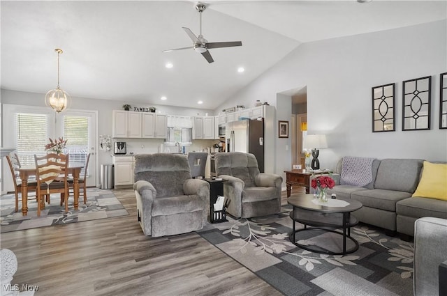 47688 Tomahawk Dr, Negley, OH 44441 - living room with a ceiling fan, lofted ceiling, light wood-type flooring, and recessed lighting