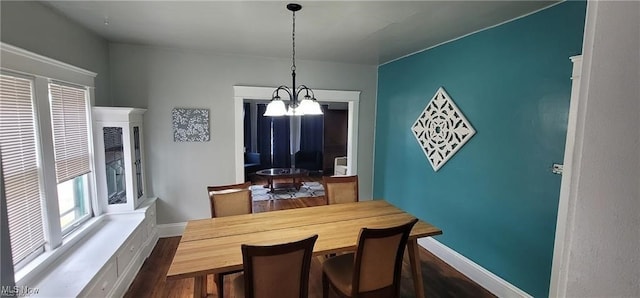 11316 Durant Ave, Cleveland, OH 44108 - dining space with wood finished floors and a chandelier