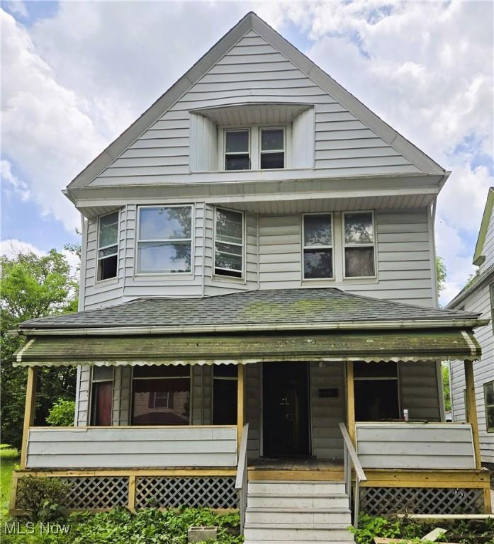 10622 Hathaway Ave, Cleveland, OH 44108 - american foursquare style home with covered porch and a shingled roof