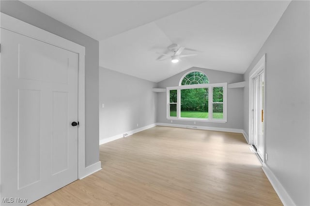 70 Maple St, Canfield, OH 44406 - empty room featuring ceiling fan, vaulted ceiling, and light wood-type flooring