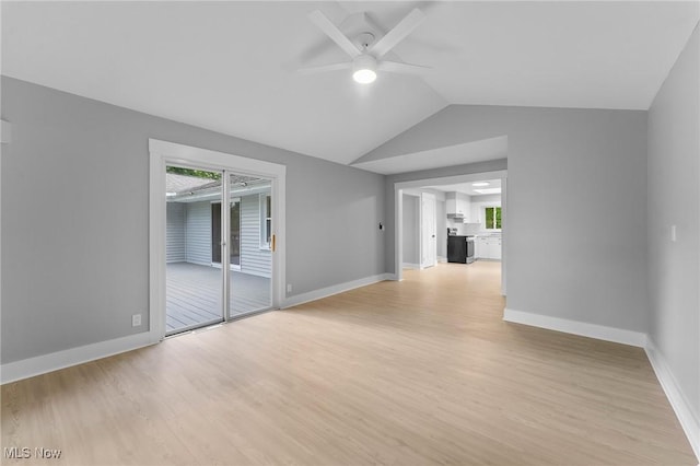 70 Maple St, Canfield, OH 44406 - unfurnished room featuring ceiling fan, light wood-style flooring, vaulted ceiling, and plenty of natural light