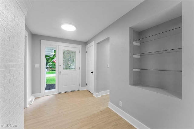 70 Maple St, Canfield, OH 44406 - entrance foyer featuring light wood-type flooring and baseboards