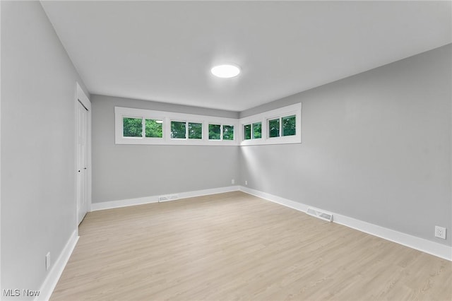 70 Maple St, Canfield, OH 44406 - unfurnished room with light wood finished floors and baseboards