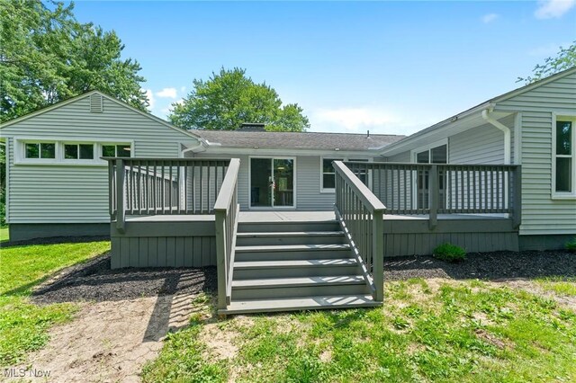 70 Maple St, Canfield, OH 44406 - rear view of property with a wooden deck and stairs