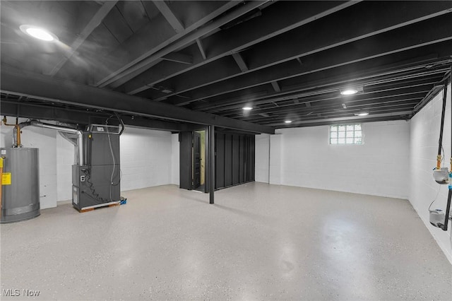 70 Maple St, Canfield, OH 44406 - basement with water heater and heating unit