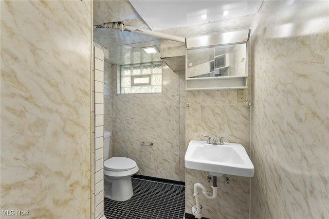 70 Maple St, Canfield, OH 44406 - bathroom featuring a sink and tile patterned flooring