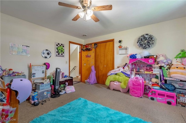 1715 High St, Louisville, OH 44641 - playroom with carpet flooring and a ceiling fan