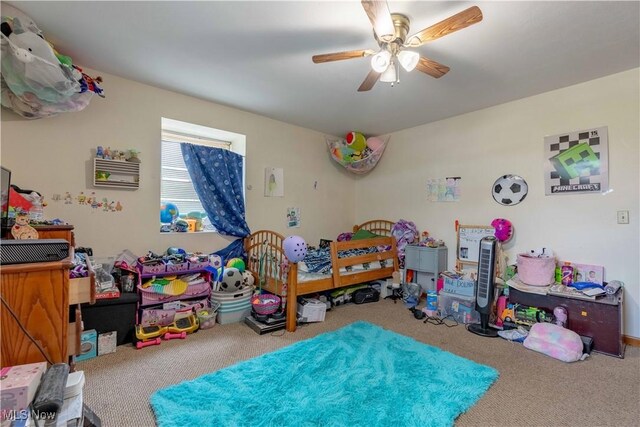1715 High St, Louisville, OH 44641 - carpeted bedroom featuring ceiling fan