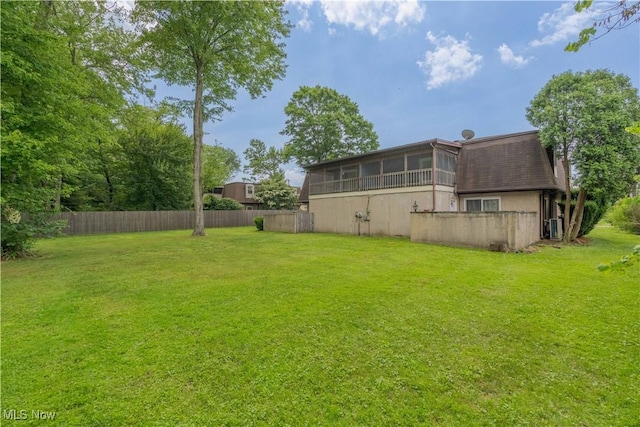 1715 High St, Louisville, OH 44641 - view of yard featuring a sunroom