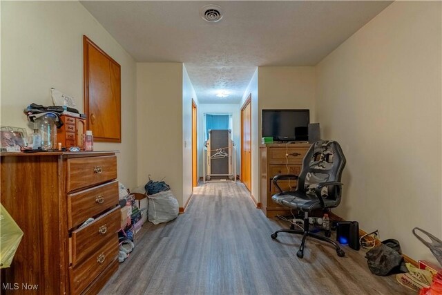 1715 High St, Louisville, OH 44641 - bedroom with wood finished floors and baseboards