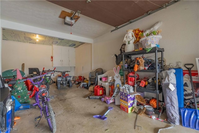 1715 High St, Louisville, OH 44641 - garage featuring a garage door opener