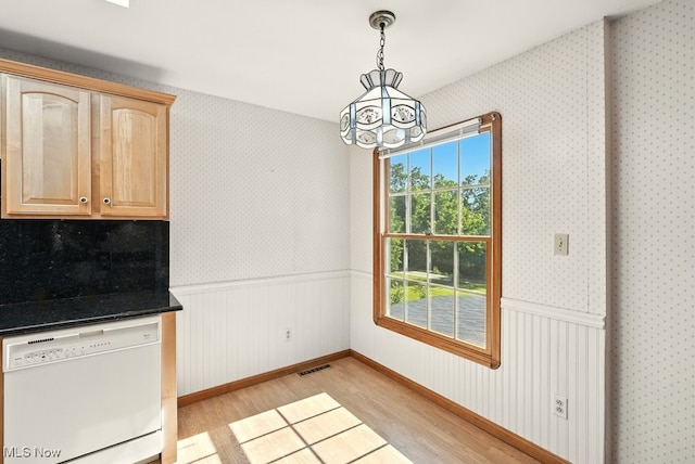 5105 E Sprague Rd, Independence, OH 44131 - unfurnished dining area featuring light wood-style flooring, a chandelier, wainscoting, and wallpapered walls