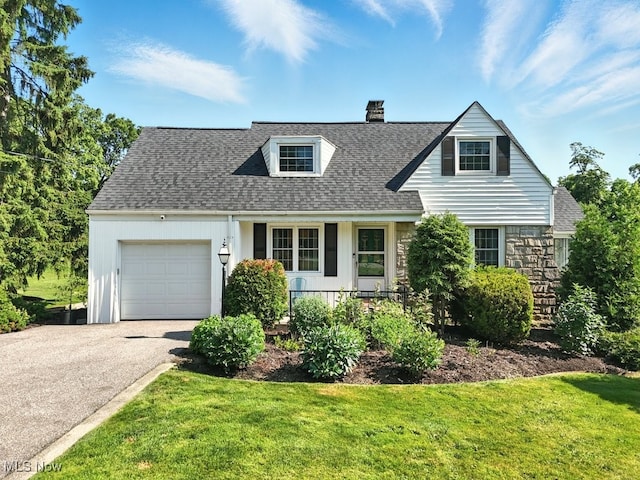 5105 E Sprague Rd, Independence, OH 44131 - view of front of property with a chimney, an attached garage, asphalt driveway, and a shingled roof